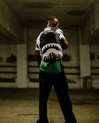 METALLIC TO THE TOUCH EXTRA DRIP BACKPACK