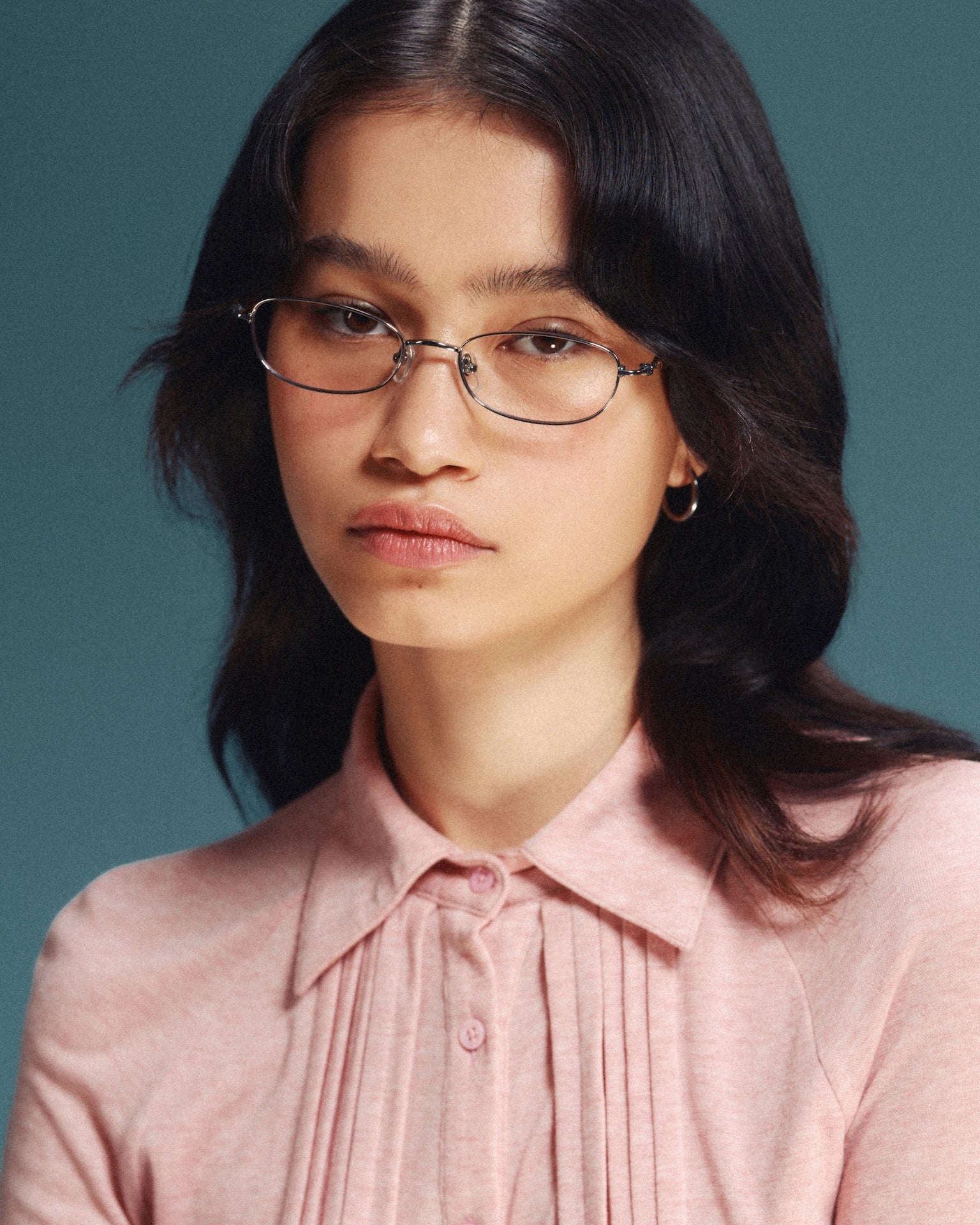 Model wearing contemporary optical frames